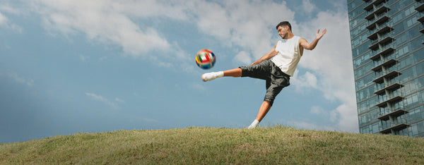 Latino man in a blue apron